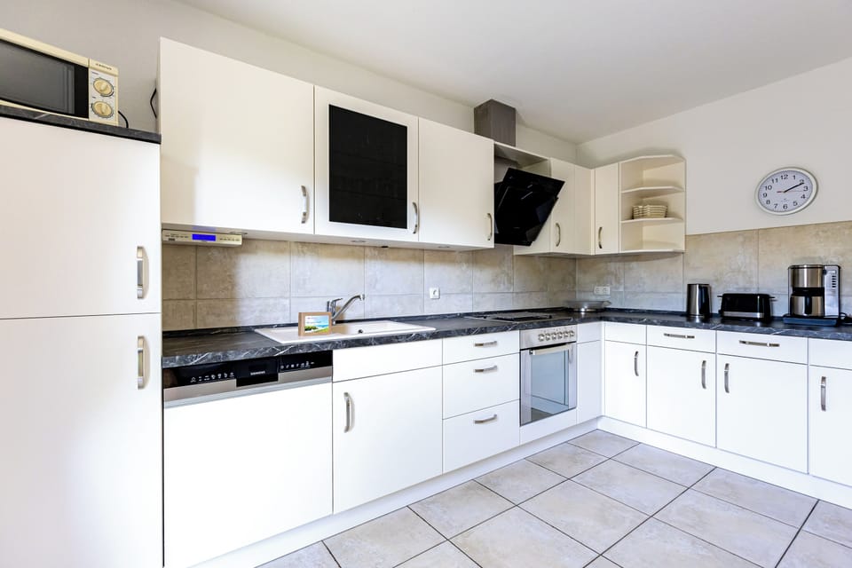 Modern Kitchen with White Cabinets
