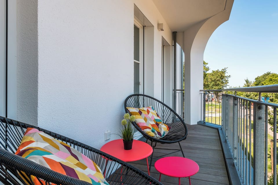 Balcony with Colorful Chairs and Table