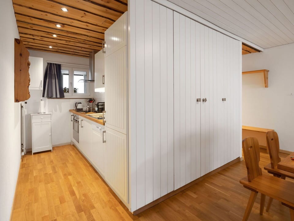 Wood, Flooring, Kitchen, Ceiling, Interior Design, Floor, Furniture, Cabinetry, Countertop, Room