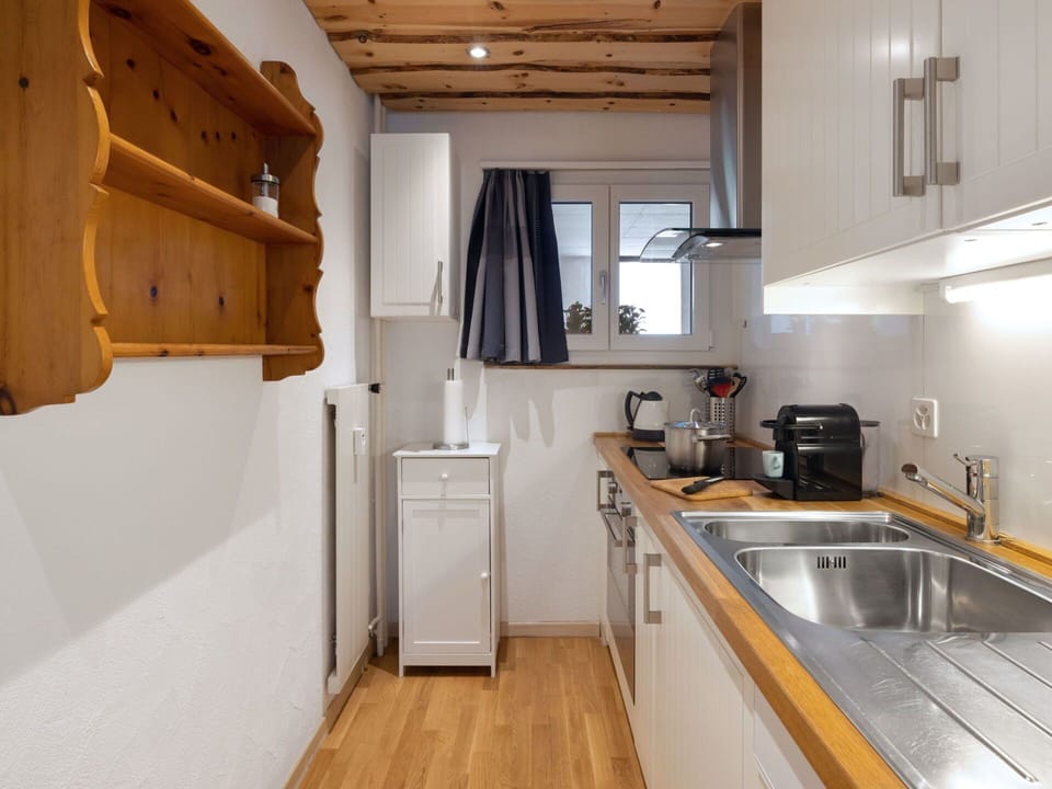 Kitchen, Wood, Countertop, Furniture, Cabinetry, Major Appliance, Interior Design, Kitchen Sink, Kitchen Appliance, Flooring