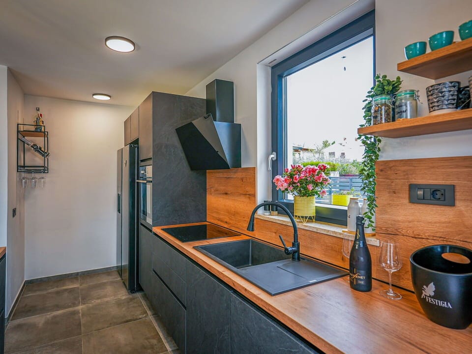 Wood, Countertop, Kitchen, Flooring, Interior Design, Home Appliance, Home, Kitchen Appliance, Cabinetry, Furniture