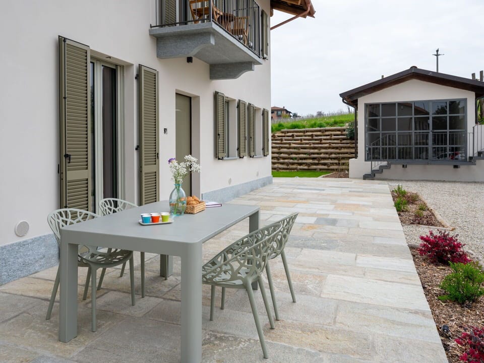 Furniture, Flooring, Table, Floor, Chair, Outdoor Furniture, Outdoor Table, Flagstone, Kitchen & Dining Room Table, Concrete