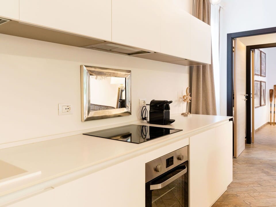 Interior Design, Countertop, Flooring, Kitchen, Wood, Furniture, Floor, Cabinetry, Kitchen Appliance, Ceiling