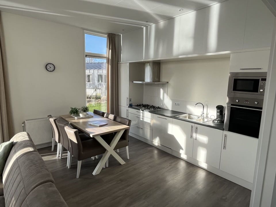 Kitchen, Flooring, Floor, Countertop, Major Appliance, Furniture, Kitchen Appliance, Cabinetry, Interior Design, Apartment