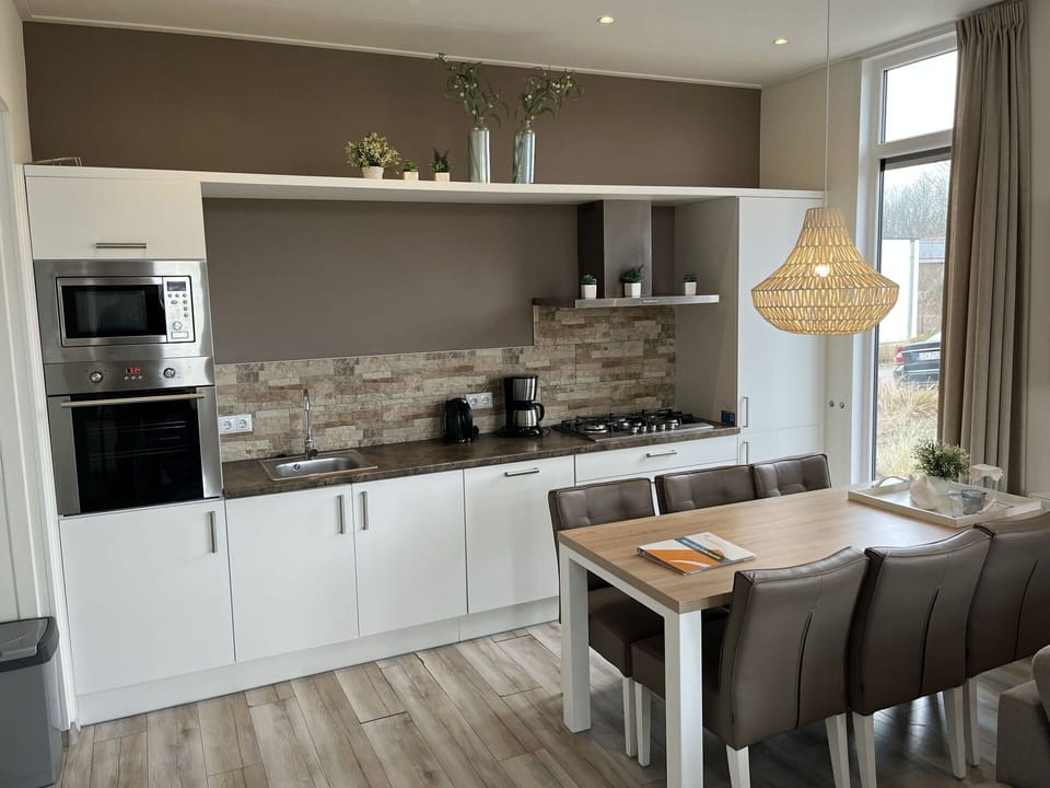 Furniture, Flooring, Wood, Interior Design, Countertop, Kitchen, Cabinetry, Floor, Ceiling, Room