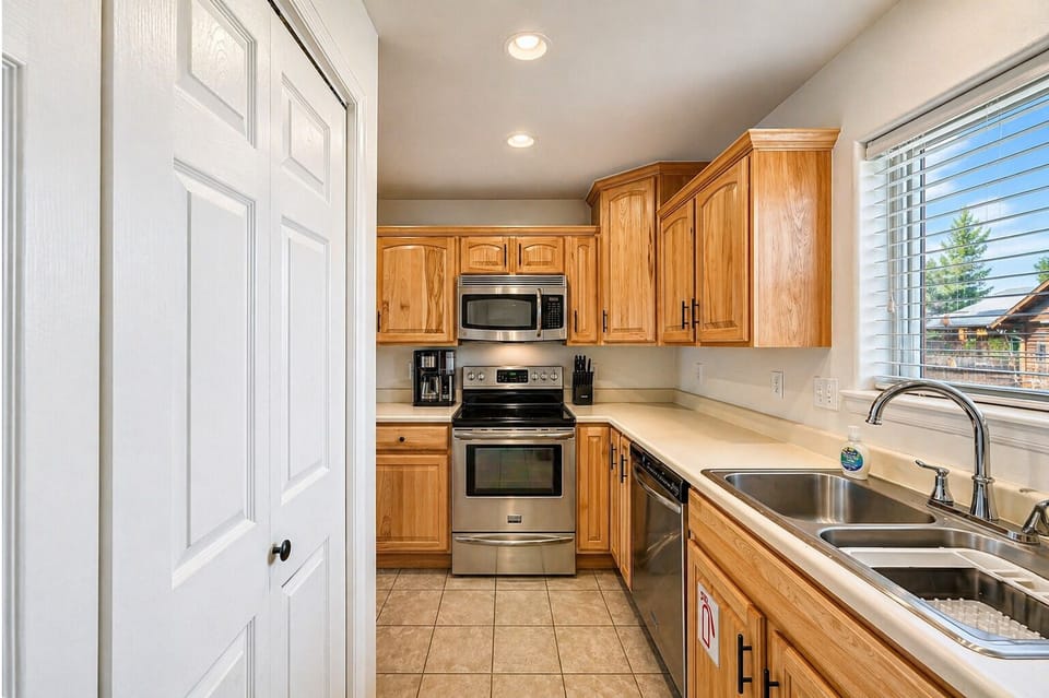 Fully equipped kitchen with everything you need—plus in-home laundry for added convenience