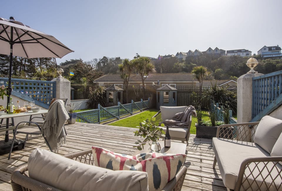 Bluebirds, Polzeath: Sunny garden with lovely raised decking