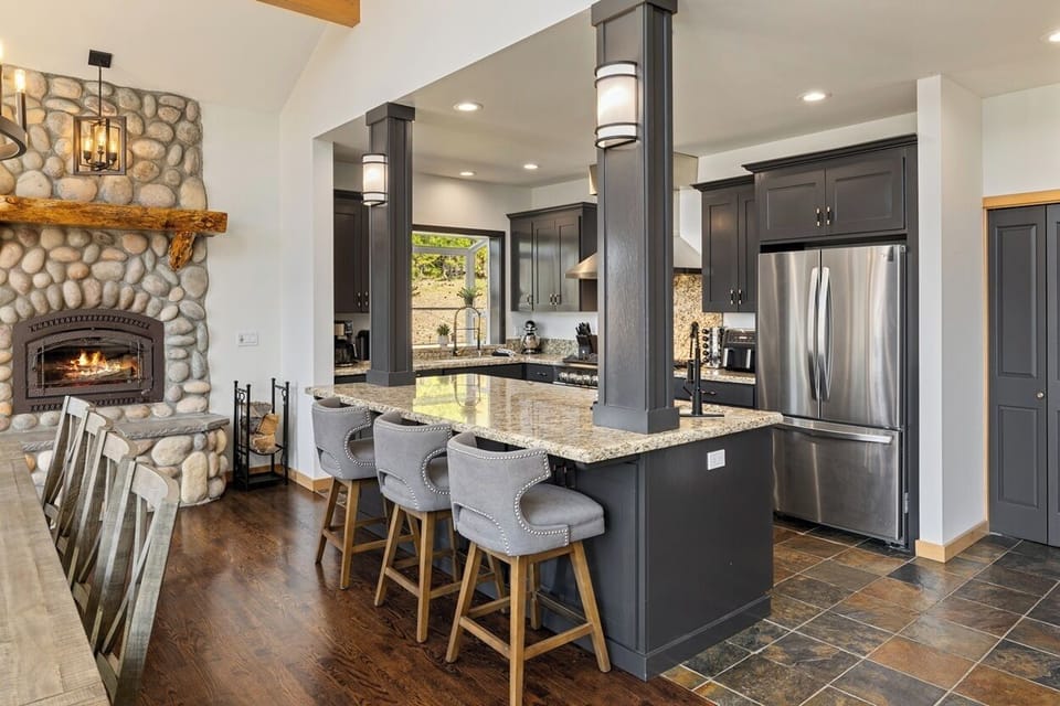 Luxury kitchen, island seating 3, and pro-grade appliances, wood burning fireplace