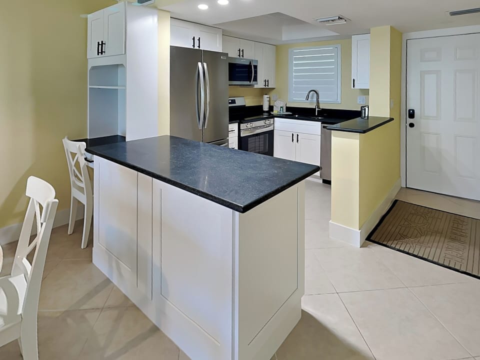 Fully Equipped Kitchen with Dedicated Workspace