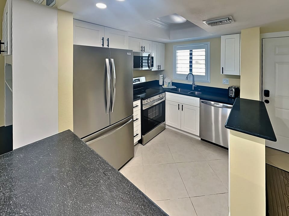 Newly Renovated Kitchen with Stainless Steel Appliances
