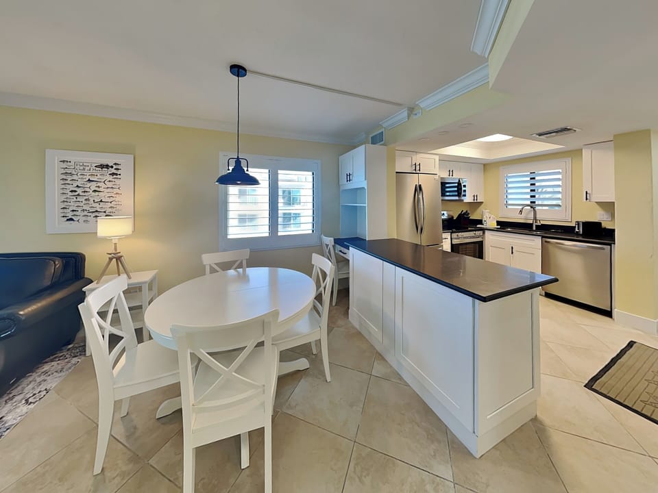 Dining Area with an Expandable Table that Comfortably Seats 4 + Dedicated Workspace