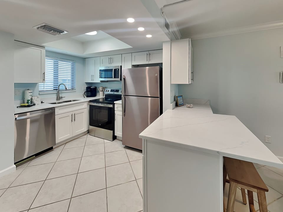 Recently Renovated Kitchen with Breakfast Bar Seating for Four