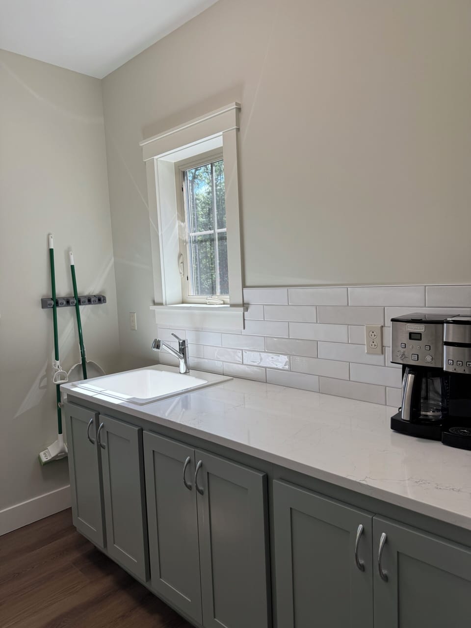 Laundry Room cabinets and additional coffee maker