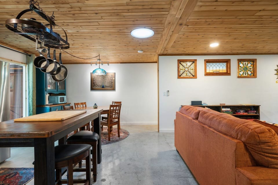 A seamless open layout lets guests move freely between dining, lounging, and relaxing with ease.