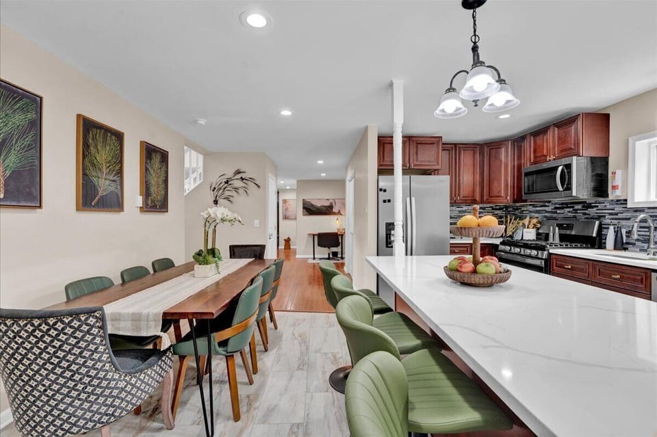 Create family meals with ease in the fully stocked kitchen featuring modern appliances, ample counter space, and cookware for every recipe
