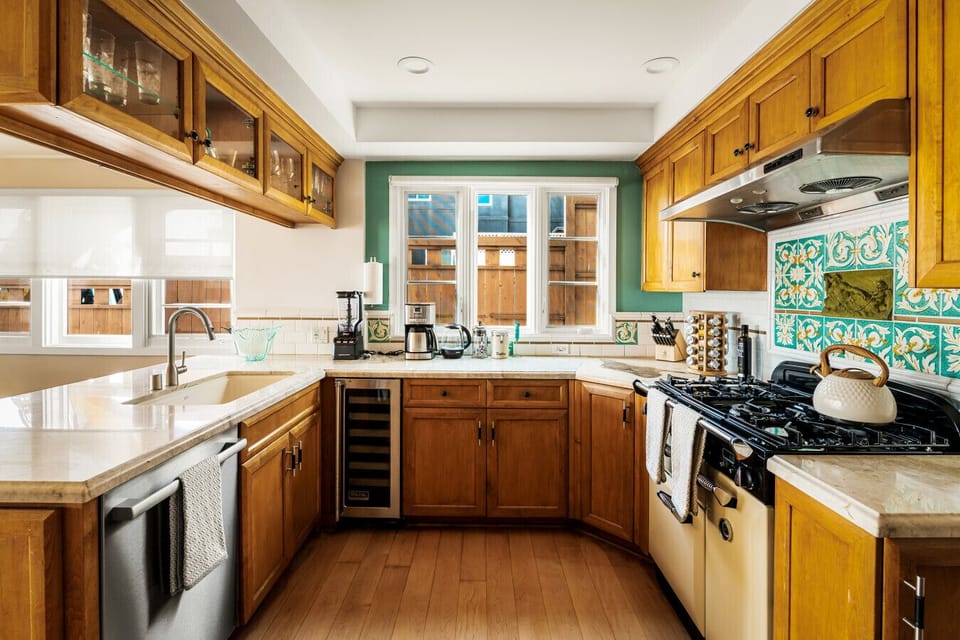 Warm wood, vintage vibes, and a splash of color—this is heart-of-the-home energy.