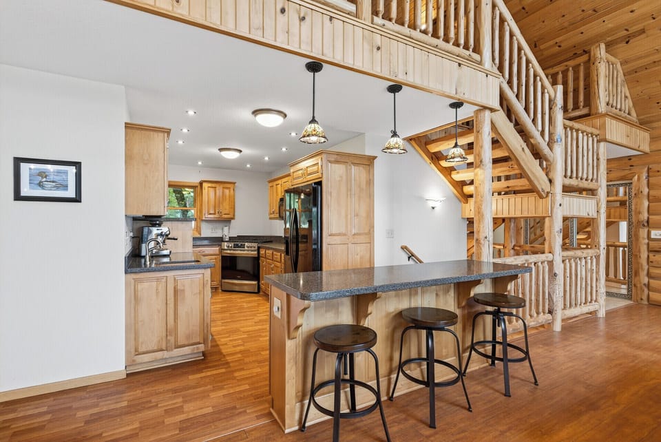 Chef-ready kitchen area with counter seating at the breakfast bar.