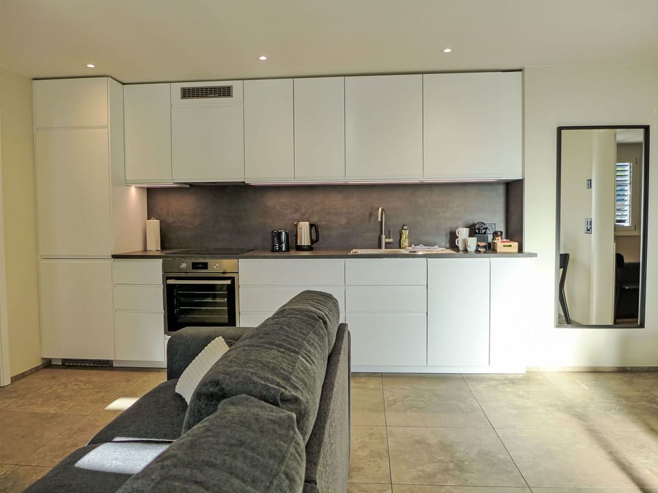 Furniture, Countertop, Kitchen, Interior Design, Flooring, Kitchen Appliance, Cabinetry, Floor, Wood, Ceiling
