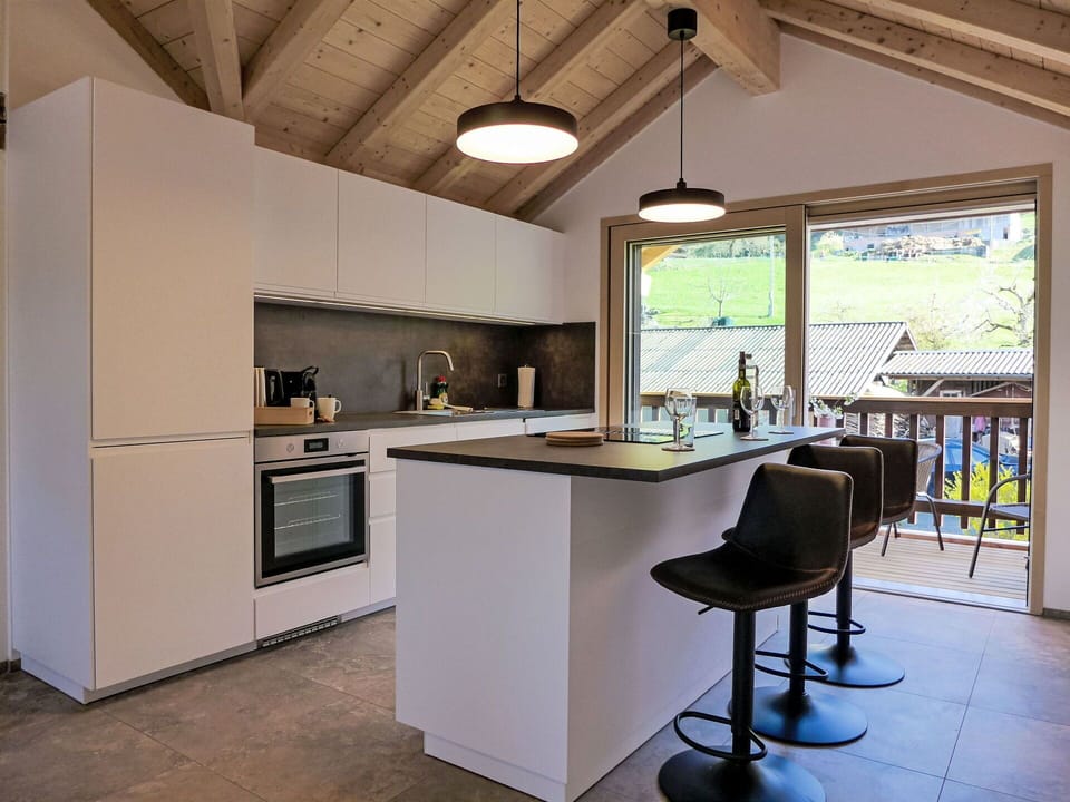 Kitchen, Furniture, Countertop, Interior Design, Flooring, Cabinetry, Wood, Ceiling, Light Fixture, Kitchen Appliance