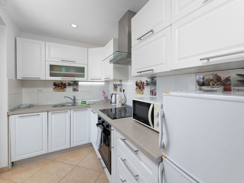 Furniture, Wood, Interior Design, Cabinetry, Kitchen, Flooring, Countertop, Cupboard, Room, Wood Stain