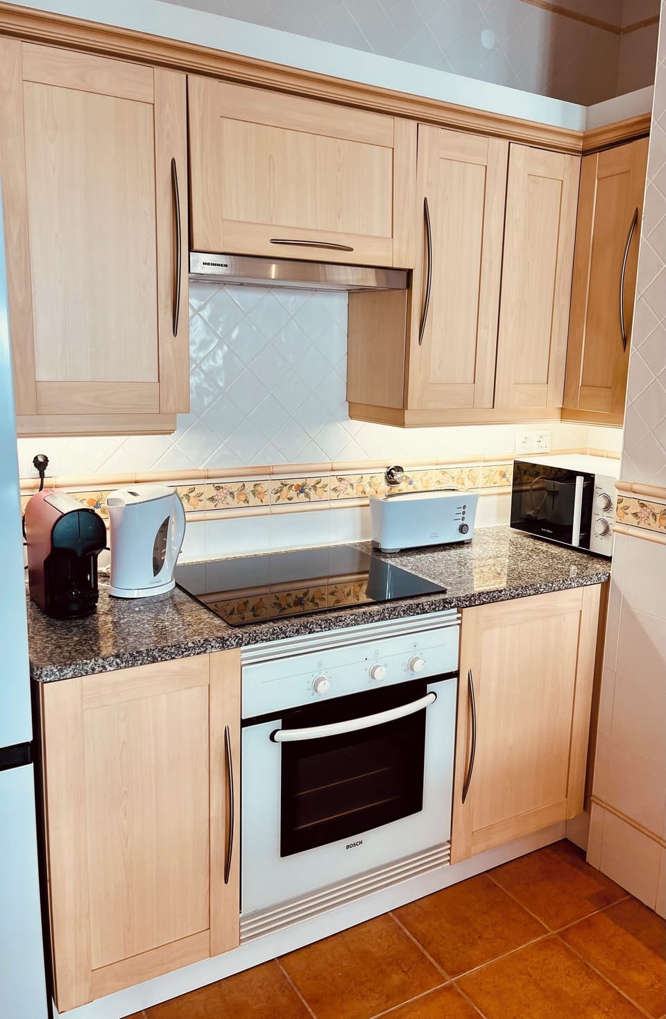 toaster, kettle, coffee maker and microwave