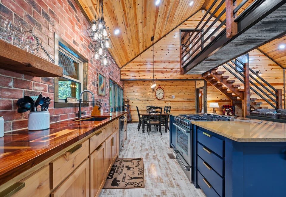 This view of the kitchen shows off the clean layout and generous workspace, perfect for prepping meals with friends or family.
