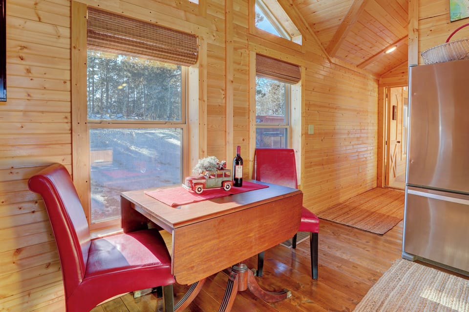 Dine at this cozy table for two with beautiful views right outside your window.