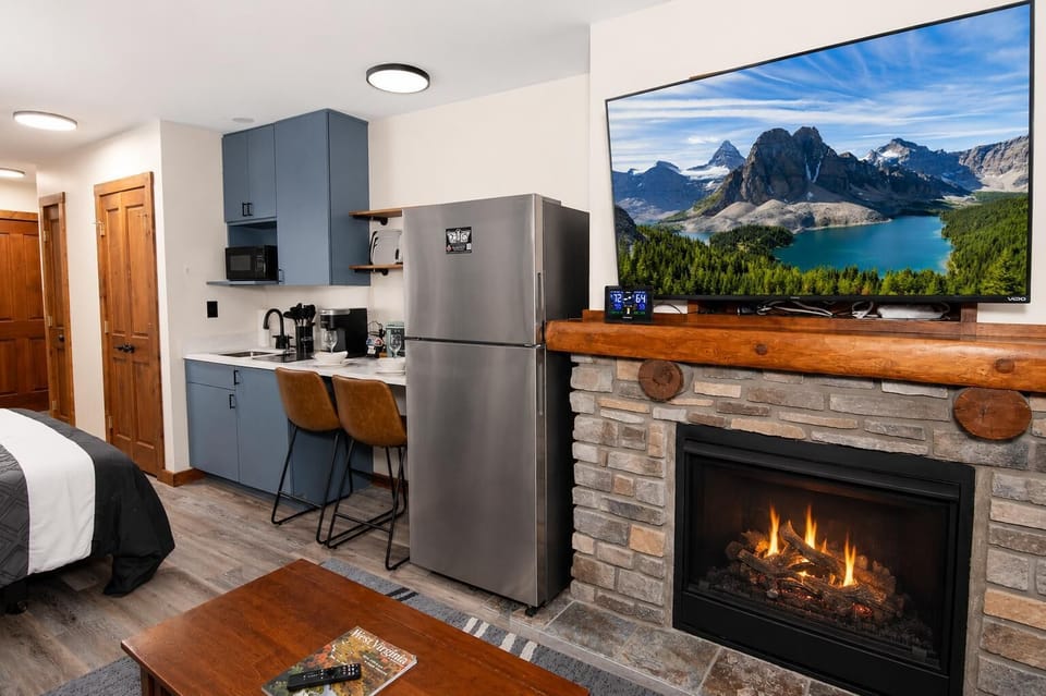 Warm up by the cozy gas fireplace after a day on the mountain.