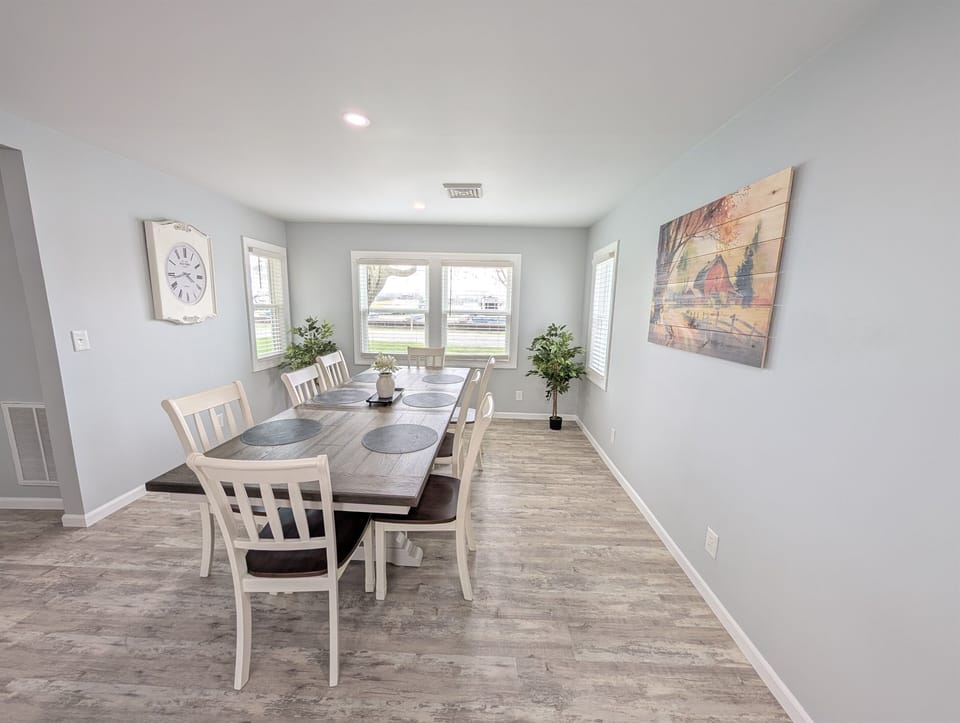 Enjoy our large dining room table with multiple windows looking across the quiet street to the Sandusky River and Memory Marina.
