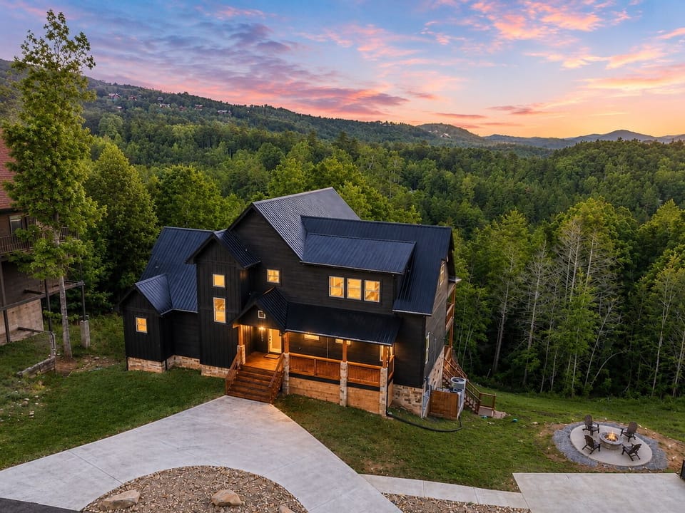 Modern mountain retreat with sunset views, forest privacy, and fire pit