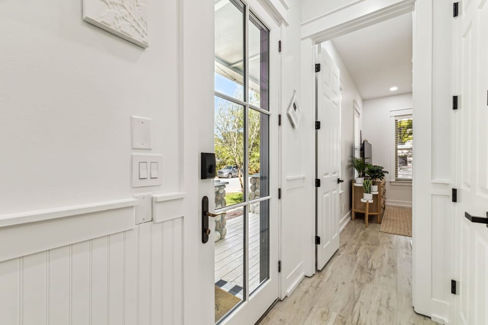 Main entrance from the inside with required short term rental postings