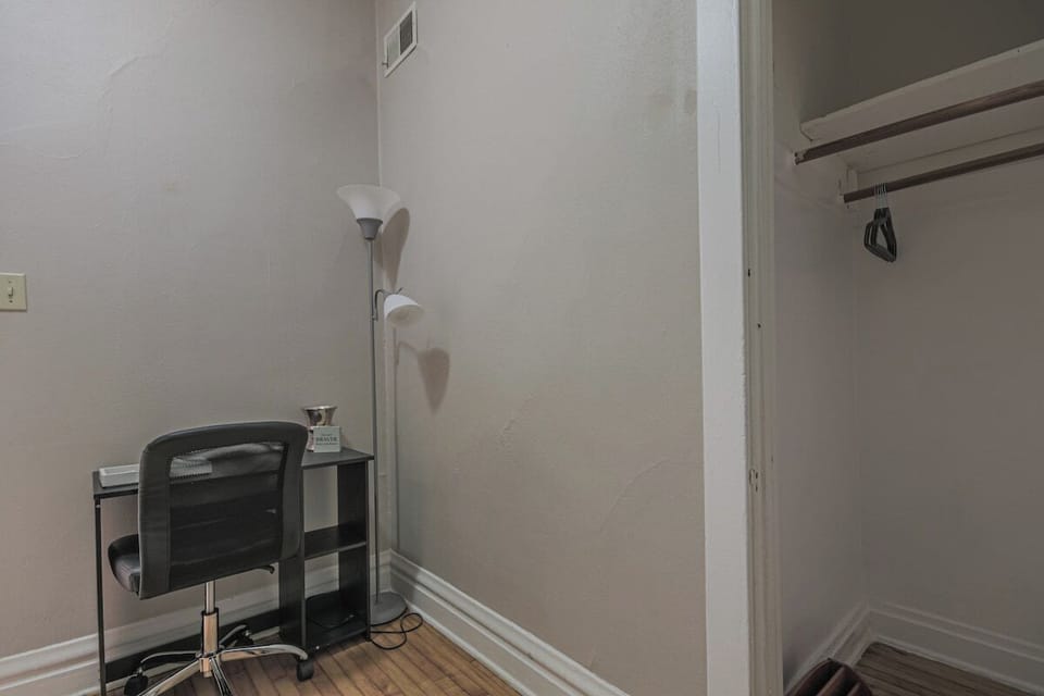 Dedicated workspace w/ desk and chair for remote work or study time.