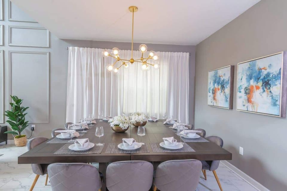 Large entertaining area. Dining table for 12. Fully equipped kitchen. 
ChampionsGate 5Bedroom Private Pool and Spa. Grill. Free water park. 