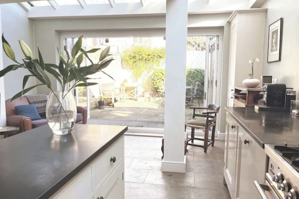 Kitchen leads onto back garden