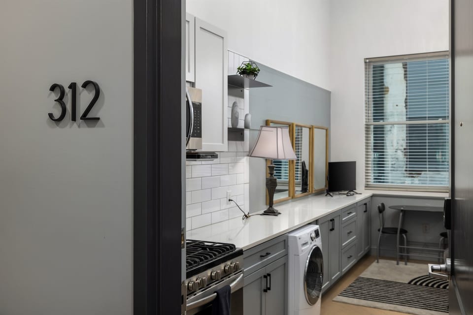 Step into a welcoming entrance with a modern touch, setting the tone for your comfortable and inviting stay.