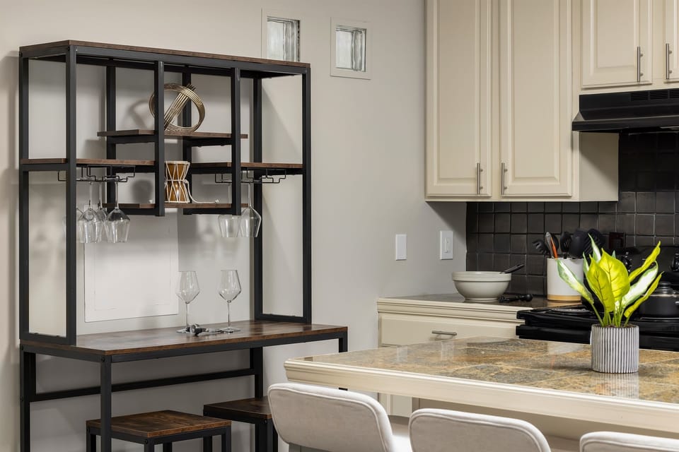 Chic and inviting, our kitchenette doubles as a sophisticated wine bar, where you can unwind with your favorite vintages, complemented by shatterproof glassware. Reach out to us for our personalized concierge services and handpicked local experiences