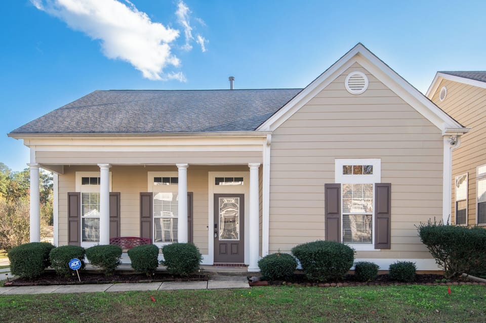 Charming front view of Bessemer Beauty, a warm and inviting home-away-from-home in a peaceful neighborhood.