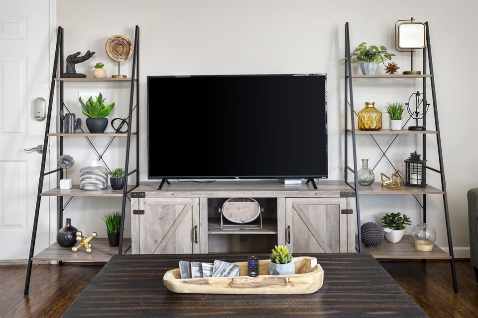 Stylish entertainment center with decorative shelving and modern accents