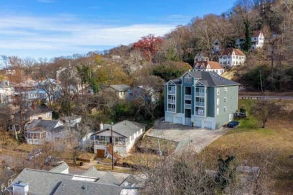 Scenic aerial view showcasing the building’s peaceful location within a charming neighborhood.