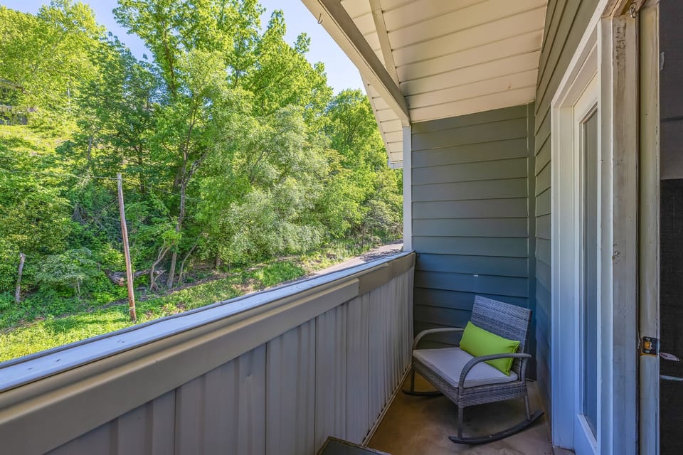 Private Balcony: Rocking chair seating, perfect to enjoy your morning coffee. *note it does not face the city, it faces the side yard.