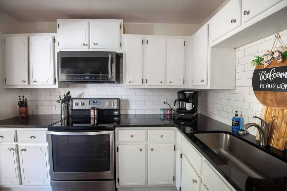 Fully equipped kitchen including a coffee maker