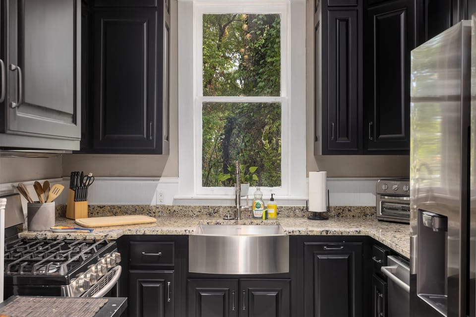 Conveniently tackle dishes in our kitchen's large stainless steel sink.