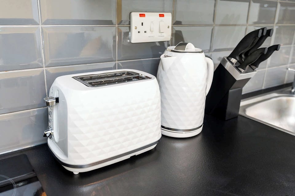 The kitchen is equipped with brand-new kettle and toaster, along with all the other essential appliances you'll need for a comfortable stay.