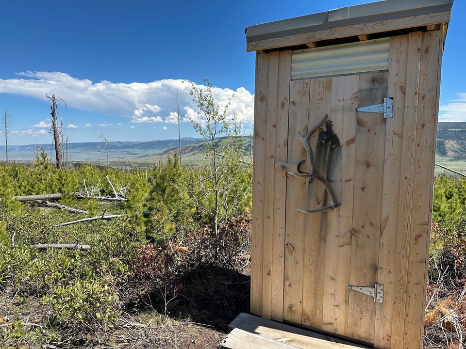Outhouse for when "nature calls".