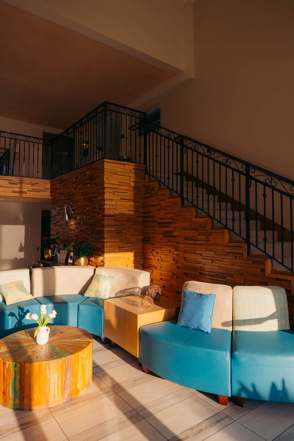 Sink into plush seating and enjoy a calm, sunlit moment.