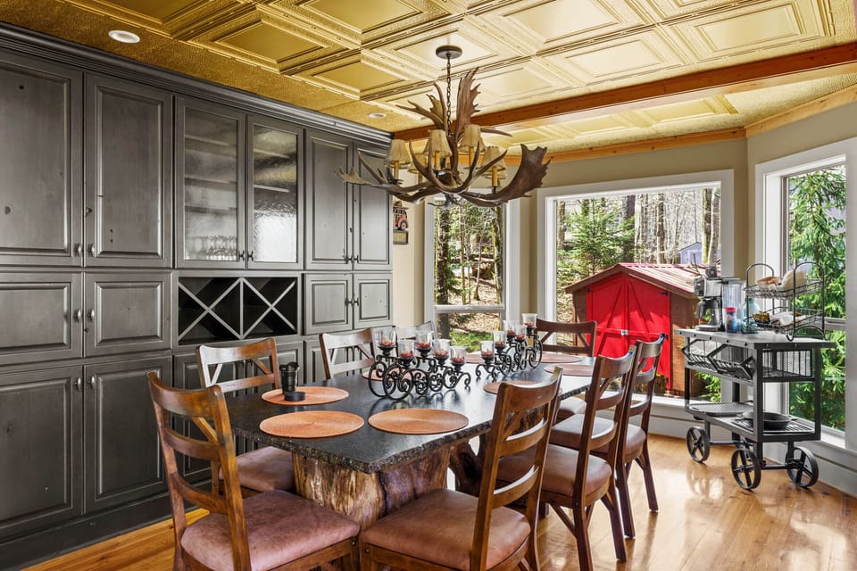 Dining Room with Coffee Cart, Custom Built-in China Cabinet. and Unique Gold Ceiling
