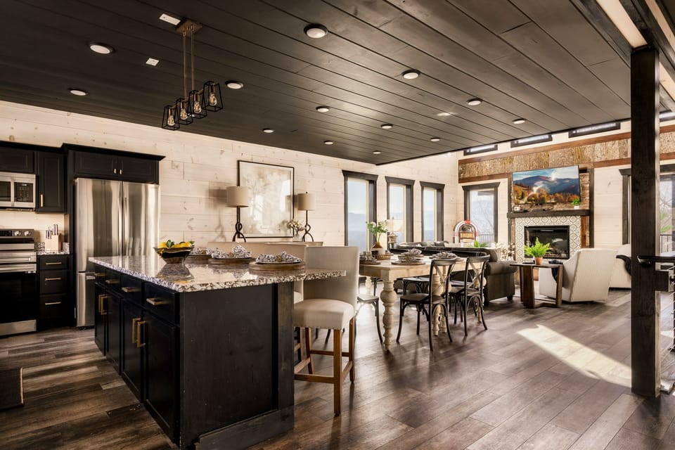 Spacious Gathering Area – The open living room offers plush seating and a welcoming atmosphere, ideal for family time, movie nights, or quiet mornings with coffee.