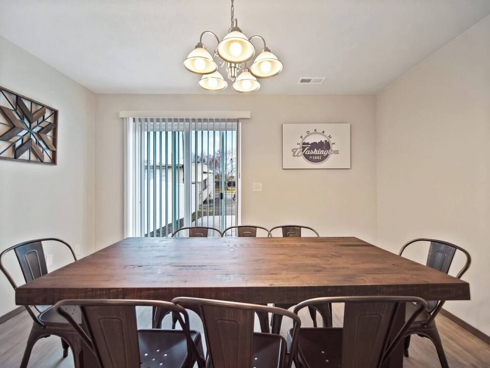 Off the dining room is the back door to the parking pad.