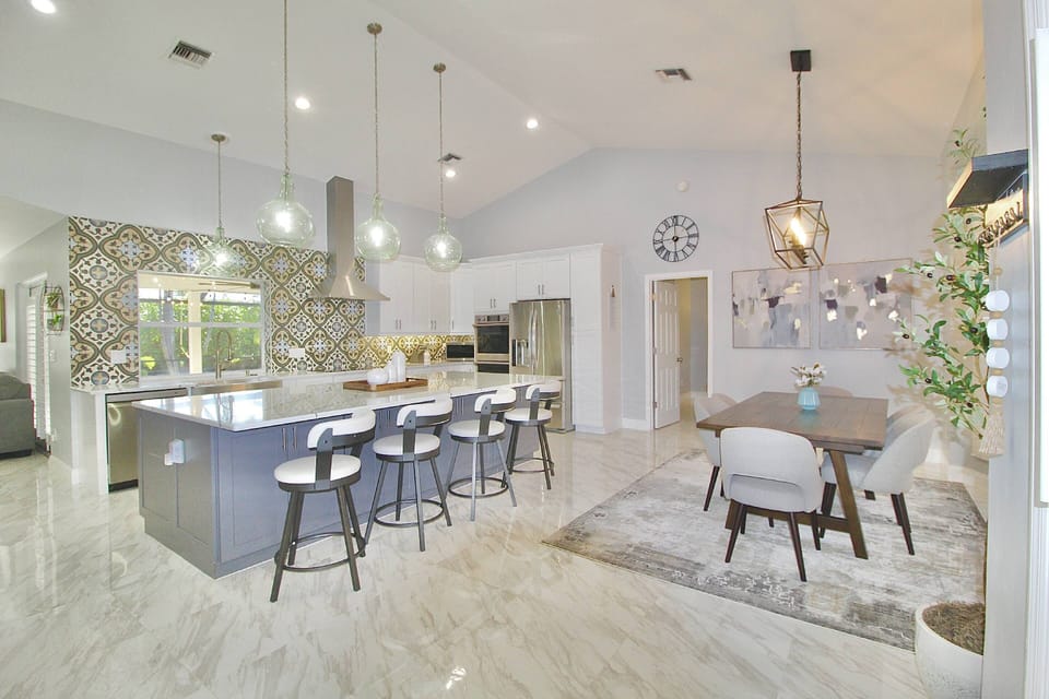 The gorgeous open, modern floorplan is bright and inviting!