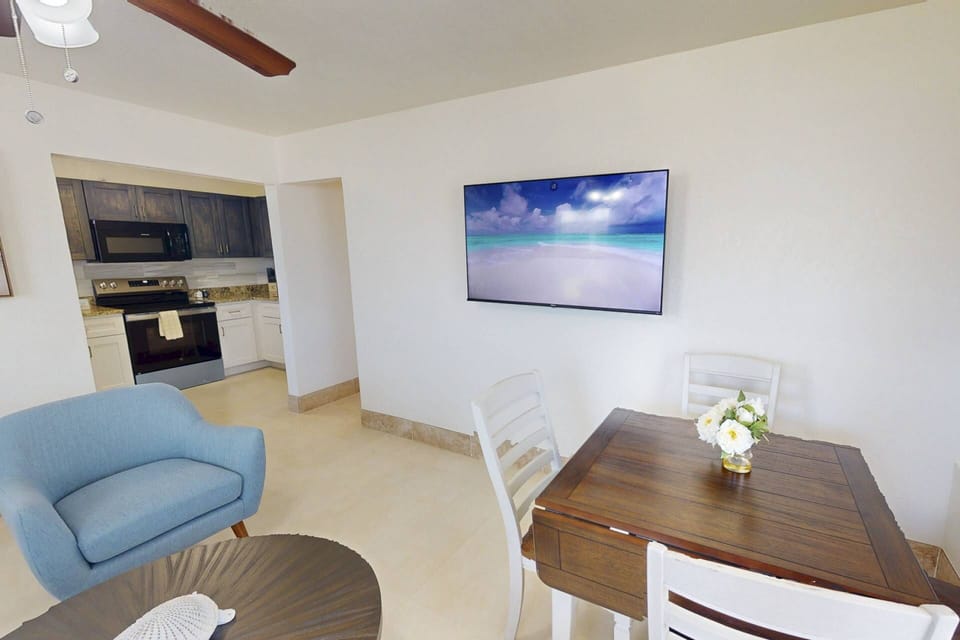 Enjoy TV viewing from both the dining area and the couch.